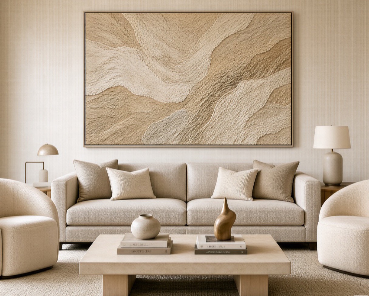 Staged living room with large textured wall art
